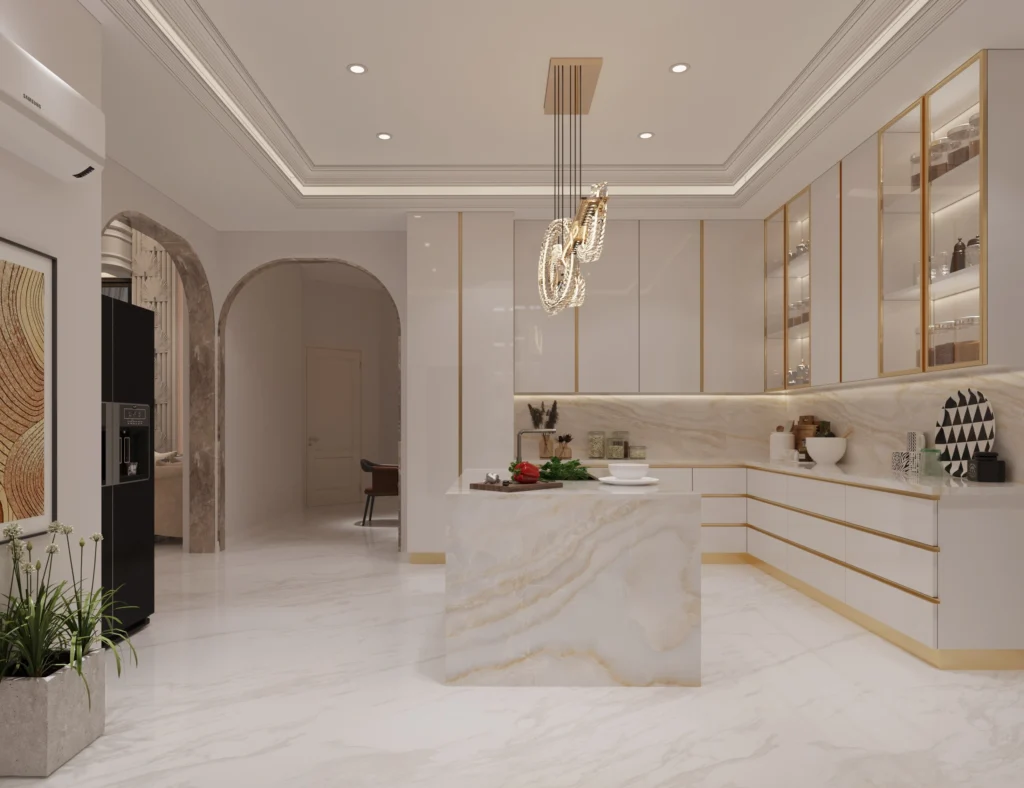 Contemporary modular kitchen with marble island, gold-accented cabinets, built-in appliances and elegant lighting by Amartya Architects | modern kitchen interior design India
