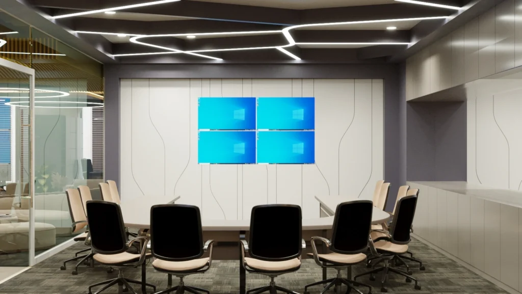 Modern office conference room interior with integrated display screens, ergonomic seating, and designer ceiling lighting by Amartya Architects
