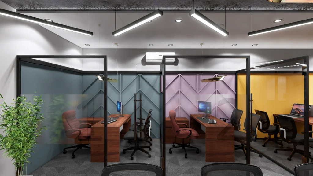 Private office cabins with glass walls, colorful accent panels, modern lighting and workspace planning by Amartya Architects in Delhi NCR