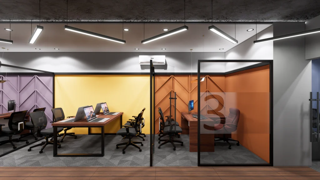 Contemporary office interior with collaborative workstations, glass cabins and modern ceiling lights designed by Amartya Architects