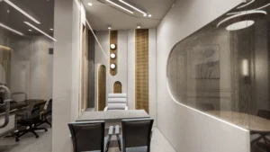 Luxury medical director room interior with contemporary furniture, curved wall design and warm lighting by Amartya Architects for clinics.