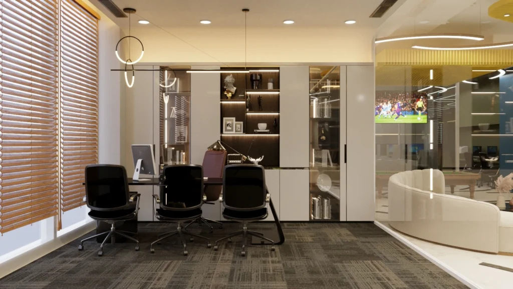 Executive office cabin with premium furniture, display storage, glass partition, and lounge seating designed by Amartya Architects for modern workplaces.