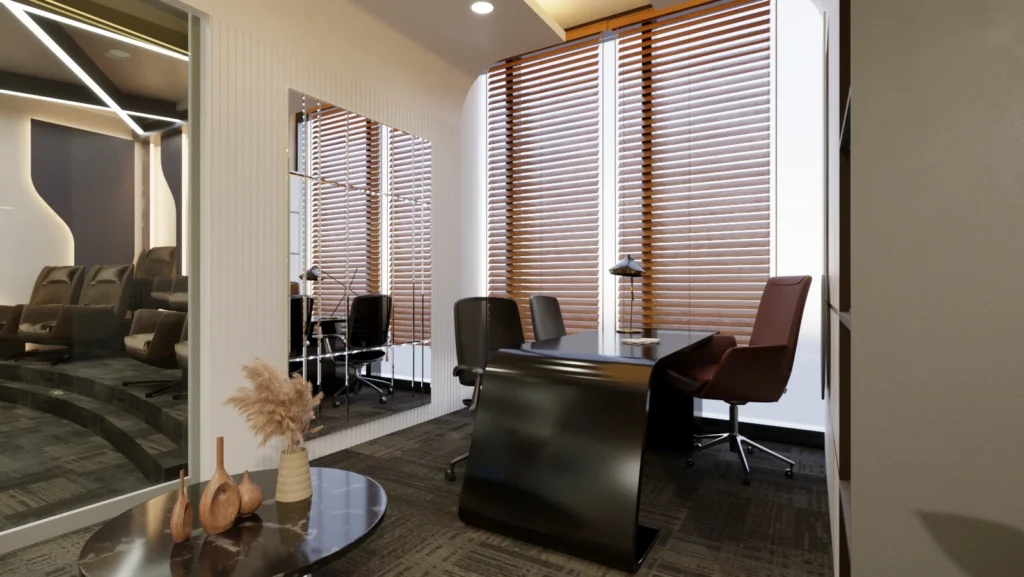 Modern executive cabin interior with sleek desk, ergonomic chairs, window blinds, and premium lighting designed by Amartya Architects for corporate offices