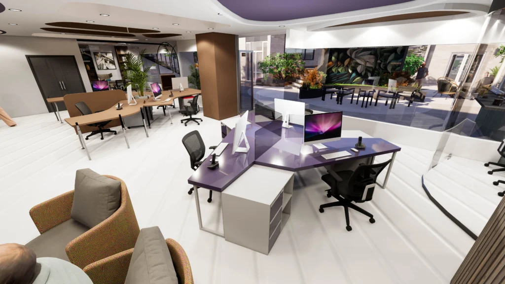 Contemporary office workstation layout by Amartya Architects with shared desks, glass walls, indoor plants, natural light and seamless indoor outdoor workspace integration.