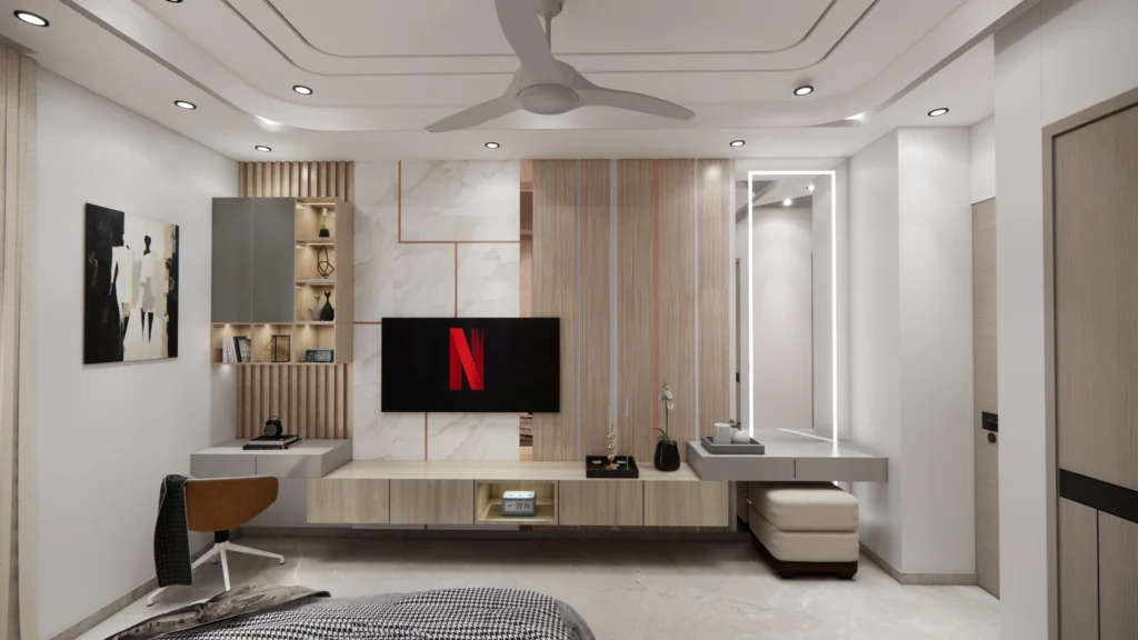 Modern bedroom interior design with TV unit, dressing mirror, marble wall panels and warm lighting, thoughtfully designed by Amartya Architects for a contemporary home.