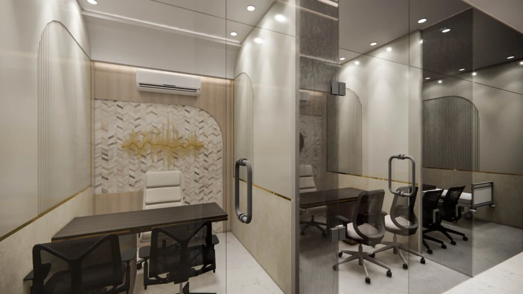 Modern doctor cabin interior with glass walls, minimal furniture and acoustic detailing by Amartya Architects for premium healthcare clinics.