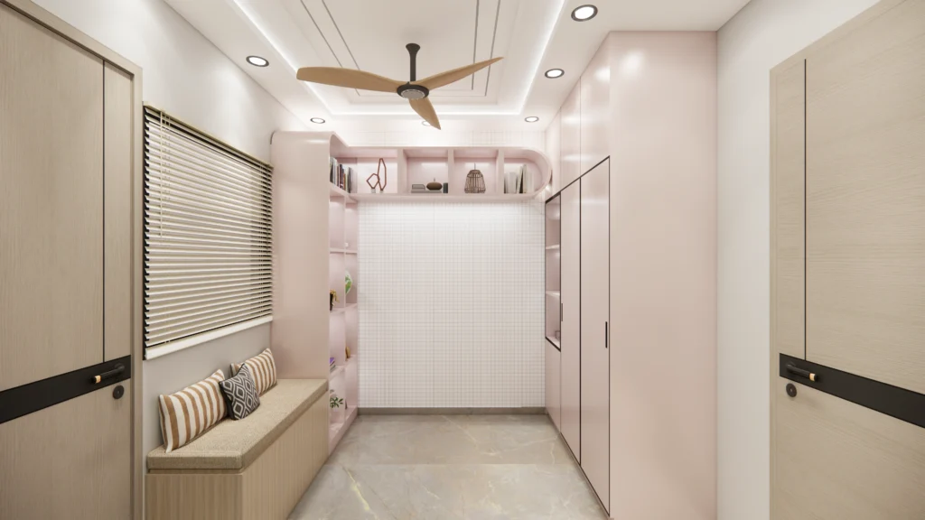 Modern bedroom interior design by residential interior designer near me, featuring custom wardrobe, seating niche, soft pastel finishes and space-saving solutions for small bedroom interiors.