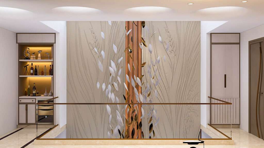 Designer double height lobby with artistic feature wall and pantry bar unit, created by best interior designers near me specializing in residential interior designers near me and commercial interior designers near me projects.