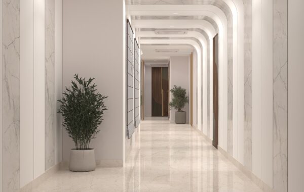 Modern luxury corridor interior with marble flooring, curved arch ceiling design, wall panel detailing and indoor planters by interior designer near me offering home interior design near me, interior design consultants near me and residential interior designers near me services for premium homes
