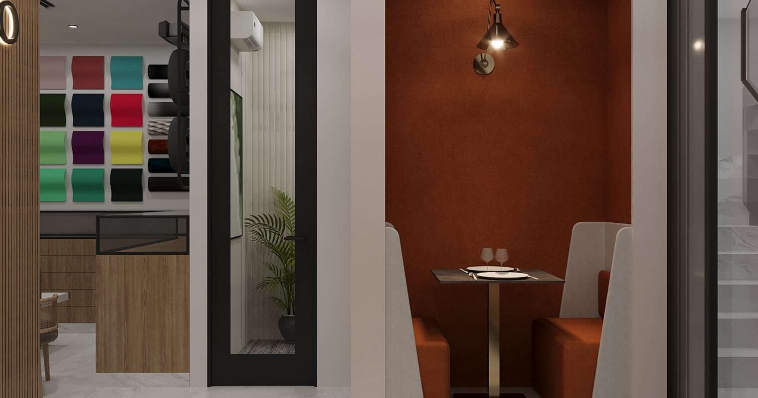 Modern office pod seating and breakout nook with warm lighting, upholstered booths and compact dining table designed by Amartya Architects, one of the local interior designers company in Rohini, Delhi, specializing in creative office interior design and modern workspace interiors.